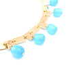 metal squares made into necklace with turquoise stones throughout
