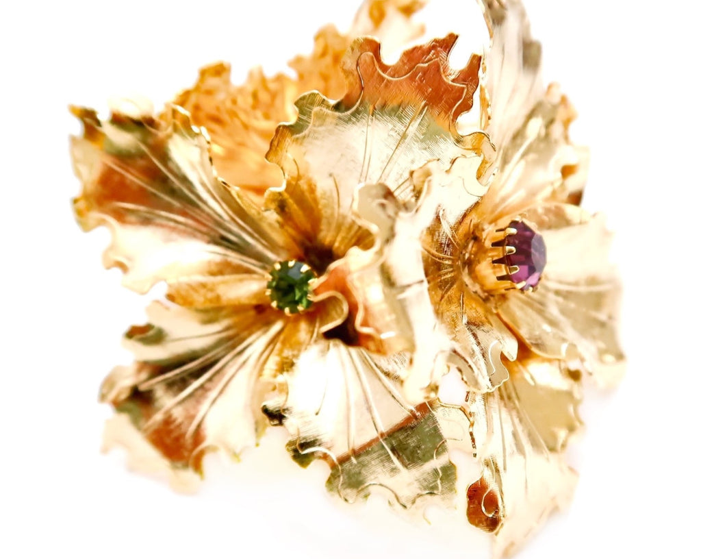 large gold metal flower bracelet with Swarovski stones