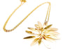 dainty necklace with metal flower pendant
