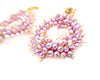 cluster of pearls in wreath shape dangling from Swarovski stones
