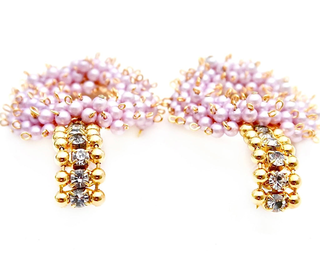 cluster of pearls in wreath shape dangling from Swarovski stones