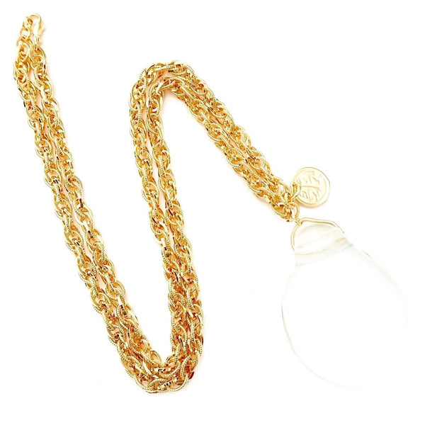 long gold chain with clear pendant and Persian coin