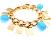 chain bracelet with metal square and turquoise charms