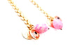 chain earrings with evil eye pink stone and Persian coin