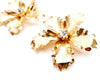 large metal flower earrings with Swarovski stone in center