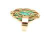 Gold twisted metal around turquoise stone ring