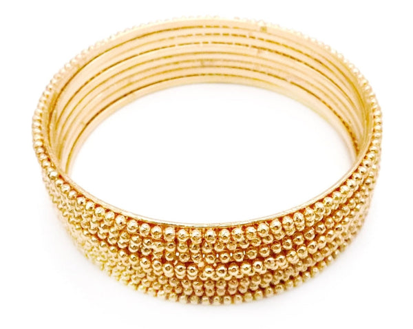 Gold bangles with ball details