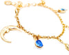 charm bracelet with fringe, crescent moon evil eye and blue stone 