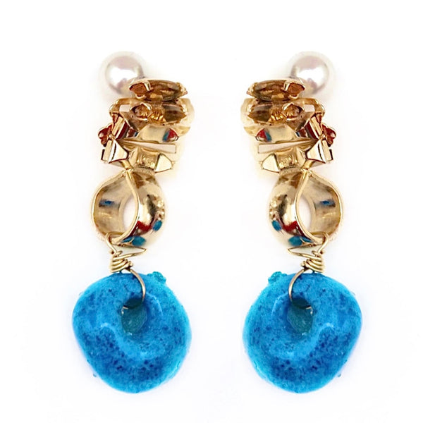 Gold earrings with almond colored stones and natural blue colored stones pearl backs