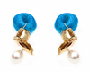 Gold earrings with almond colored stones and natural blue colored stones pearl backs