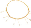 delicate gold link chain with U shaped pendant adorned with Swarovski stones at ends