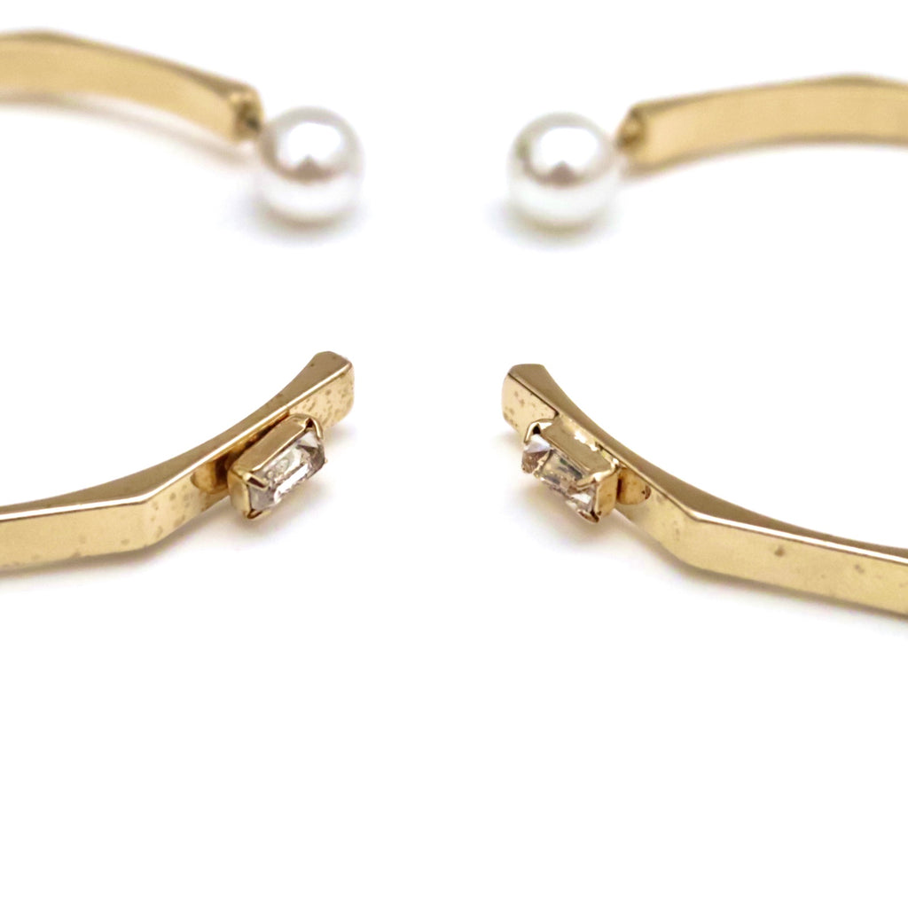 Gold metal hoops with Swarovski stones and pearl backs