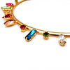 GOld collar necklace adorned with colorful Swarovski stones