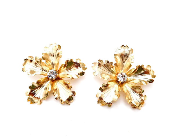 large metal flower earrings with Swarovski stone in center